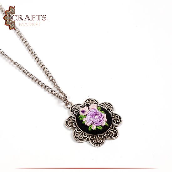 Silver Metal Necklace with a Hand-embroidered Pendant Roses design. Silver Metal Necklace with a Hand-embroidered Pendant Roses design.