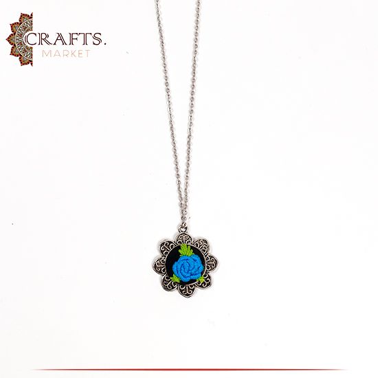 Silver Metal Necklace with a Hand-embroidered Pendant Blue Rose design. Silver Metal Necklace with a Hand-embroidered Pendant Blue Rose design.