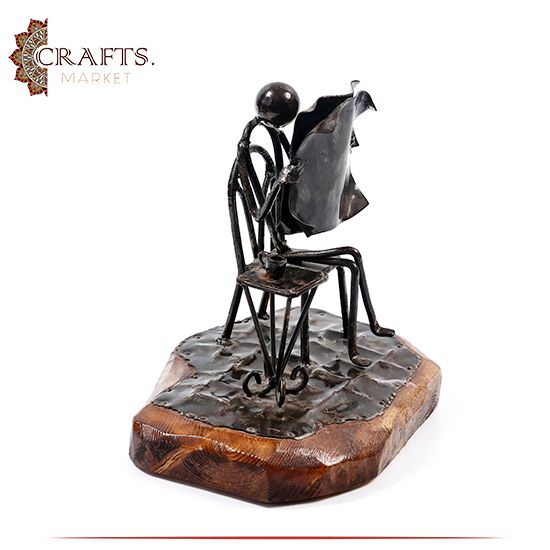 Handmade Metal Figure Table Décor in a  Newspaper Reader design