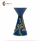 A blue pottery incense burner decorated with Arabic letters