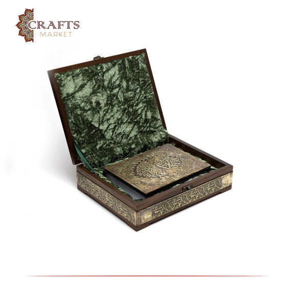 A luxurious wooden box decorated with copper containing the Holy Quran