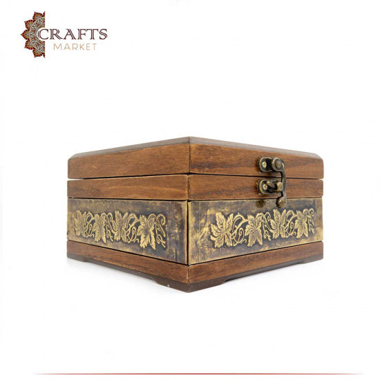 A small wooden box decorated with copper with dallah and coffee cups design A small wooden box decorated with copper with dallah and coffee cups design