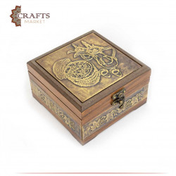 A small wooden box decorated with copper with dallah and coffee cups design
