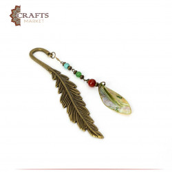Feather-designed book separator with a multi-colored seashell pendant