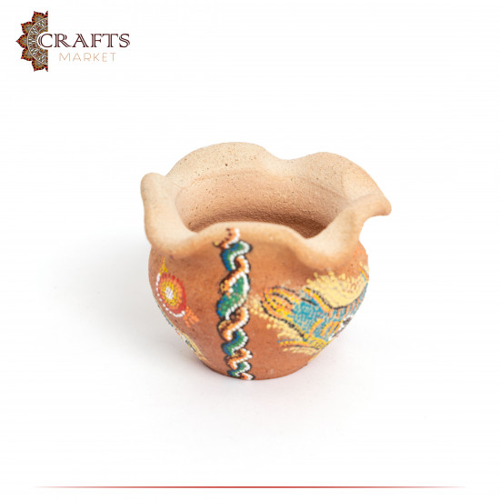Small hand-painted pottery with a Fish design Small hand-painted pottery with a Fish design