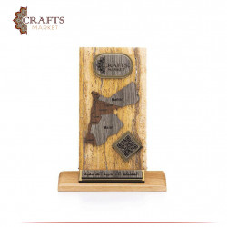 A commemorative shield of wood and marble with the design of the Map of Jordan