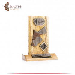A commemorative shield of wood and marble with the design of the Map of Jordan