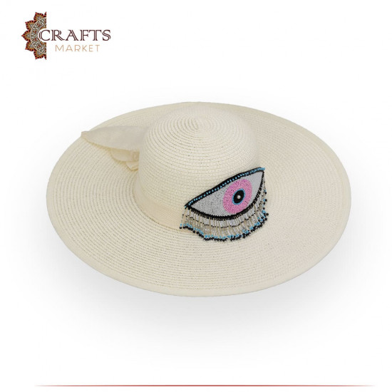 Handmade Beige straw hat with an eye design