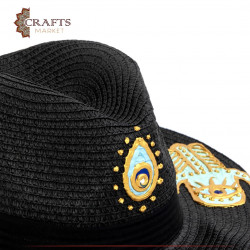 Handmade Black straw hat with a golden eye and palm design