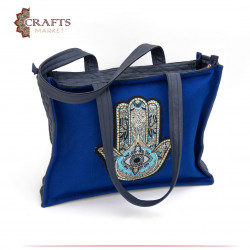 Handmade linen bag in navy color with a blue palm design
