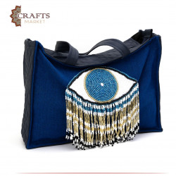 Handmade Linen bag in navy blue with a blue and white eye design